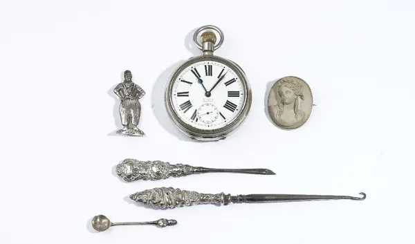 A base metal cased, keyless wind, openfaced Goliath watch, with a gilt jewelled lever movement, the enamelled dial with black Roman numerals, subsidia