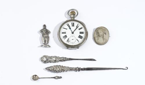 A base metal cased, keyless wind, openfaced Goliath watch, with a gilt jewelled lever movement, the enamelled dial with black Roman numerals, subsidia