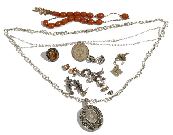 A group of mostly silver jewellery, comprising; a Victorian oval pendant locket, Birmingham probably 1883, with a later neckchain, two further pendant