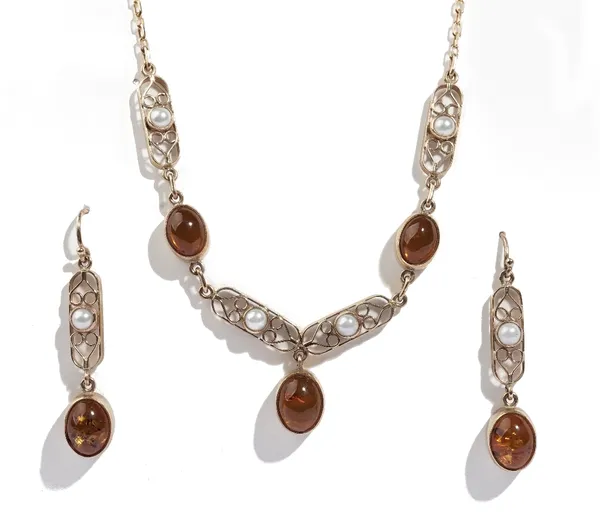 A 9ct gold, amber and cultured pearl pendant necklace, mounted with the principal oval amber to the drop and a pair of gold, amber and cultured pearl