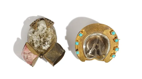 A Victorian gold and turquoise set brooch, designed as a horses hoof, with a horseshoe, having a central hair locket to the front and with a portrait