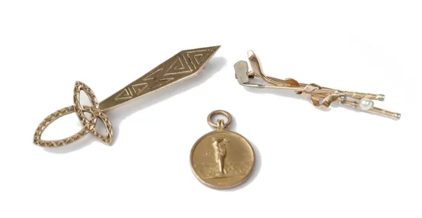 A gold and cultured pearl brooch, designed as two golf clubs, a 9ct gold fob medal, with a standing figure of a golfer motif, Birmingham probably 1913