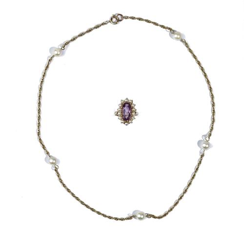 A gold, amethyst and cultured pearl set marquise shaped cluster ring, detailed 9 CT, ring size N and a gold multiple link neckchain, spaced with five