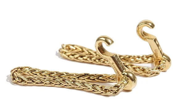 A pair of Boucheron French gold cufflinks, each in a woven chain link design, having a hook shaped fastening, detailed Boucheron 28788, combined weigh