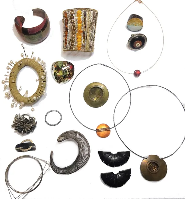 A group of modern studio jewellery, comprising; three pendant necklaces, two pendants, a varicoloured glass brooch, a pair of earclips, five bangles a