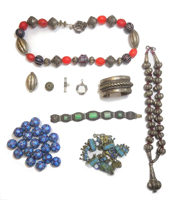 A group of Asian style jewellery, comprising; a Chinese silver and jade panel link bracelet, on a snap clasp, a bangle, two bead necklaces, a quantity