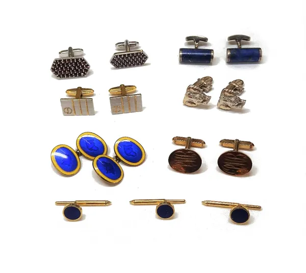 A pair of 9ct gold cufflinks, with oval fronts, monogram engraved and with folding bar fittings at the backs, gross weight 8.5 gms, a pair of Patrick