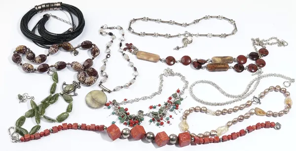 A group of jewellery, comprising;  a silver necklace in a circular link design, on a T bar and circular clasp, eight bead and other necklaces and a si