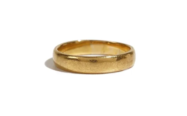 A 22ct gold plain wedding ring, Birmingham 1955, ring size N and a half, weight 5.2 gms.