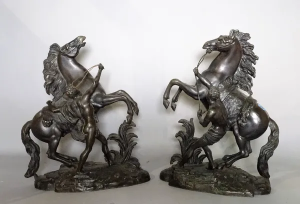 A pair of modern spelter figures of Marley horses, 43cm high, (2).