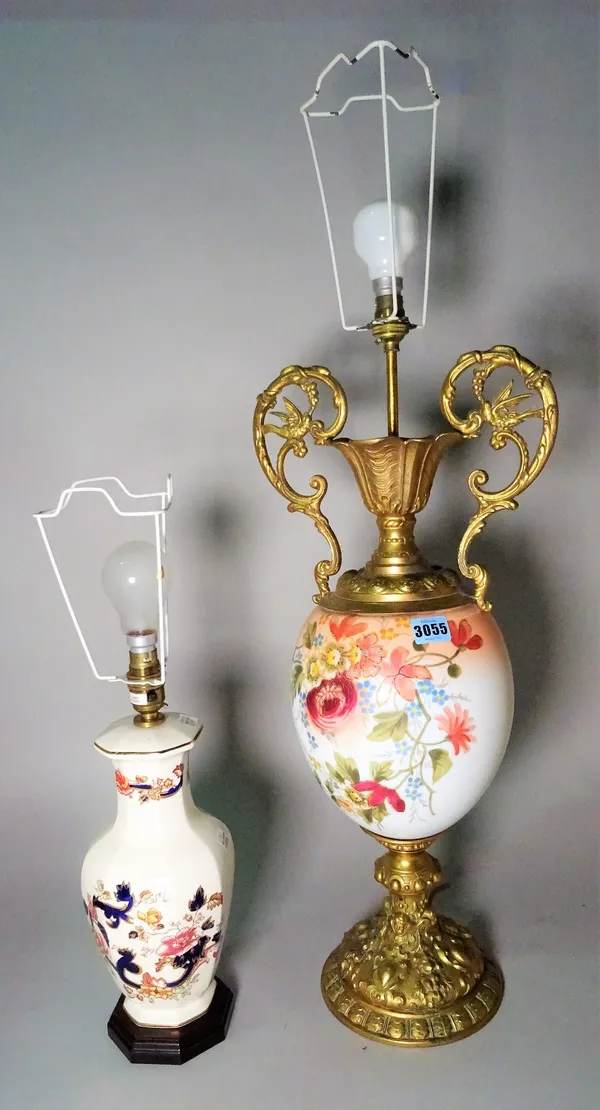 A modern gilt metal mounted and porcelain table lamp, 73cm high, and another modern ceramic table lamp, 45cm high. (2)