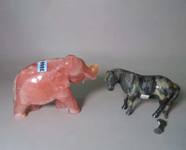 A Chinese rose quartz model of an elephant 13cm tall (a.f.), and an Asian hardstone horse 9cm tall (a.f.).