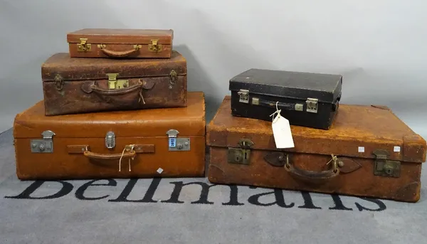 A collection of five 20th century suitcases and cases, mostly leather, various sizes, the largest approx 60cm x 41cm. (5)