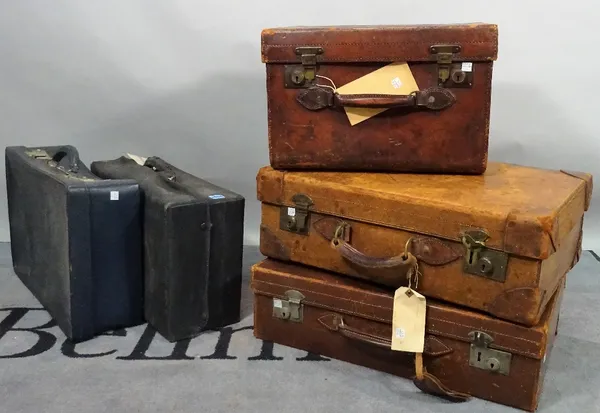 A collection of five 20th century suitcases and cases, mostly leather, various sizes, the largest 67cm x 43cm. (5)