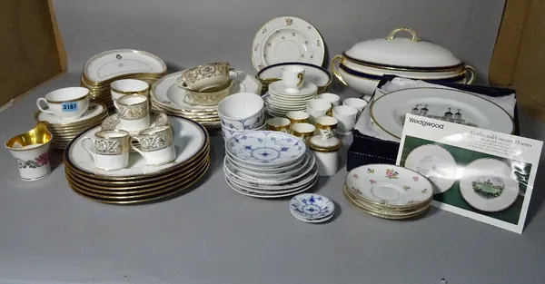 A Mintons part dinner service, early 20th century, retailed by T.Goode & Co Ltd with shaped gilt rim against a plain white ground, another similar par