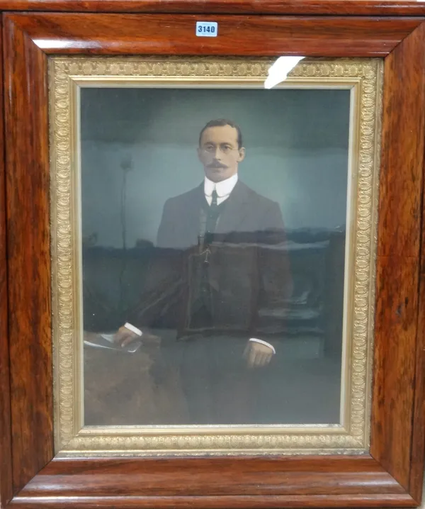 English School (late 19th century), Portrait of a gentleman, hand tinted photograph, 54cm x 41cm.; in an oak veneered and gilt plaster frame.