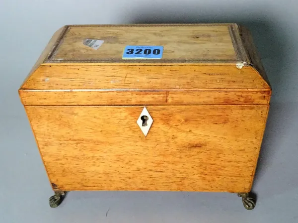 A Regency inlaid mahogany rectangular tea caddy with metal claw feet, 19cm wide x 16cm high.