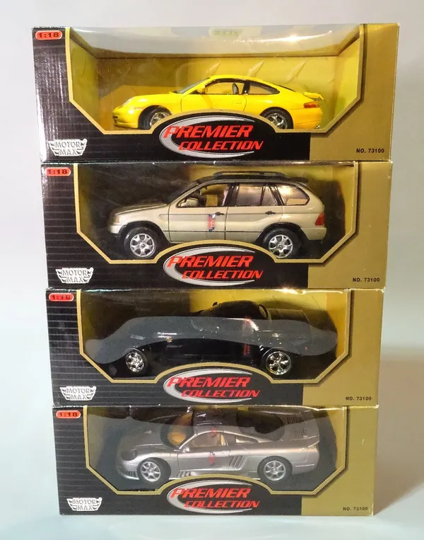 'MOTOR MAX PREMIUM COLLECTION', a group of four boxed models of vehicles.