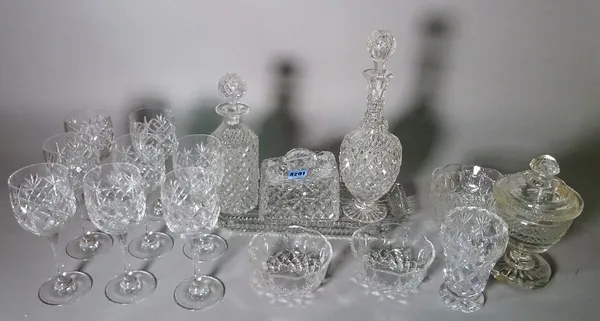 A quantity of cut glass, including decanters and drinking glasses. (qty)