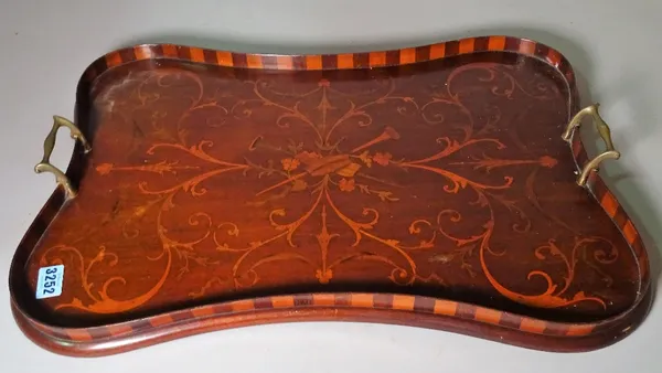 A 19th century lozenge shaped mahogany twin handled tray, 60cm wide, and an Asian tray, 55cm wide.