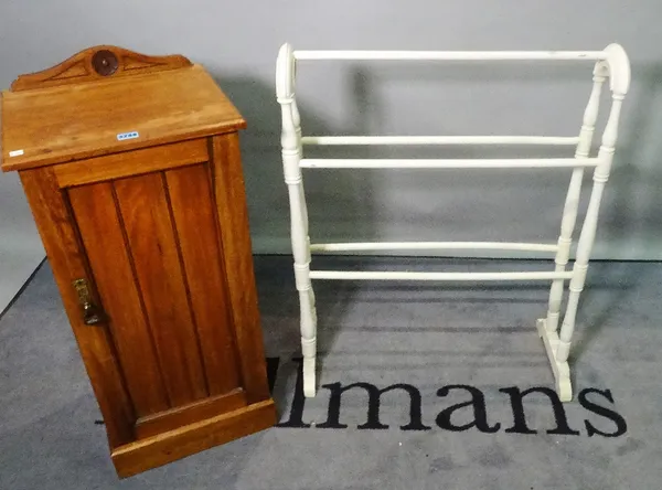 An early 20th century stained beech pot cupboard, 38cm wide x 81cm high, and a blue painted towel rail, 67cm wide x 80cm high. (2)