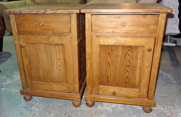 A pair of pine single drawer bedside tables, 46cm wide x 66cm high. (2)