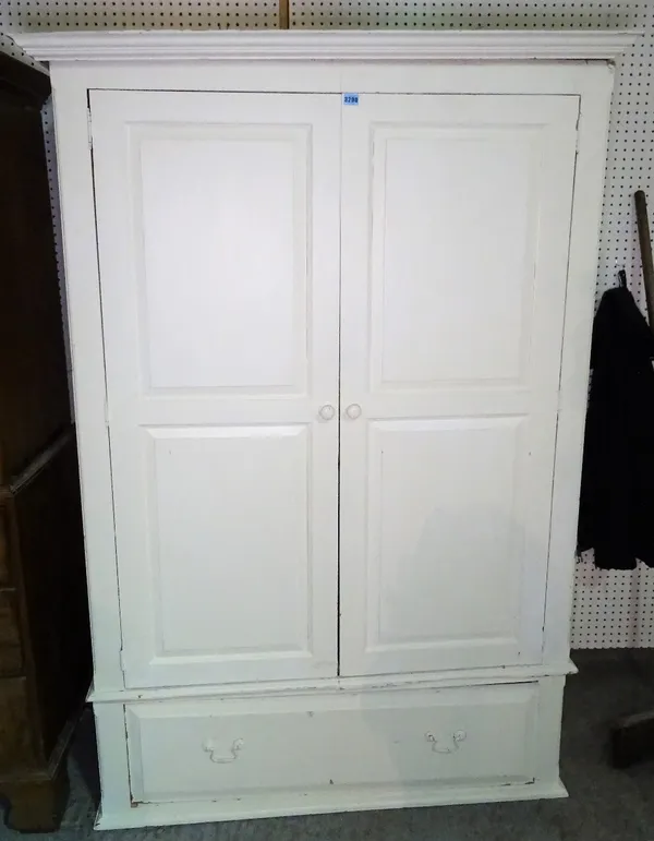 A modern white painted pine double wardrobe, with single drawer base, 126cm wide x 183cm high.