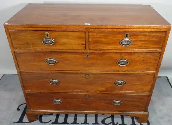 A late George III mahogany chest, of two short and three long graduated drawers on ogee bracket feet, 106cm wide x 94cm high.