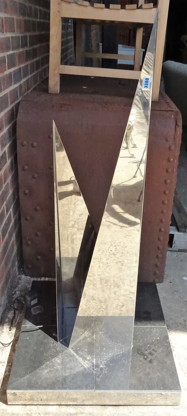 A 20th century chrome angular lamp, on a marble square plinth base, 61cm wide x 109cm high.