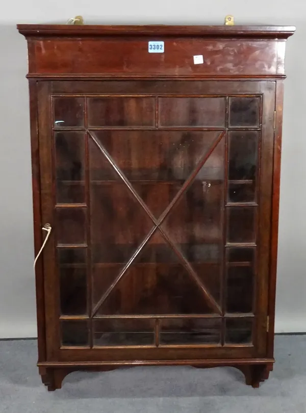 A 19th century mahogany hanging cupboard, 58cm wide x 91cm high.