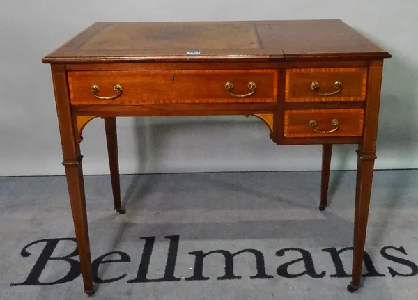 An Edwardian inlaid mahogany writing desk, with single drawer on tapering square supports, 85cm wide x 73cm high.