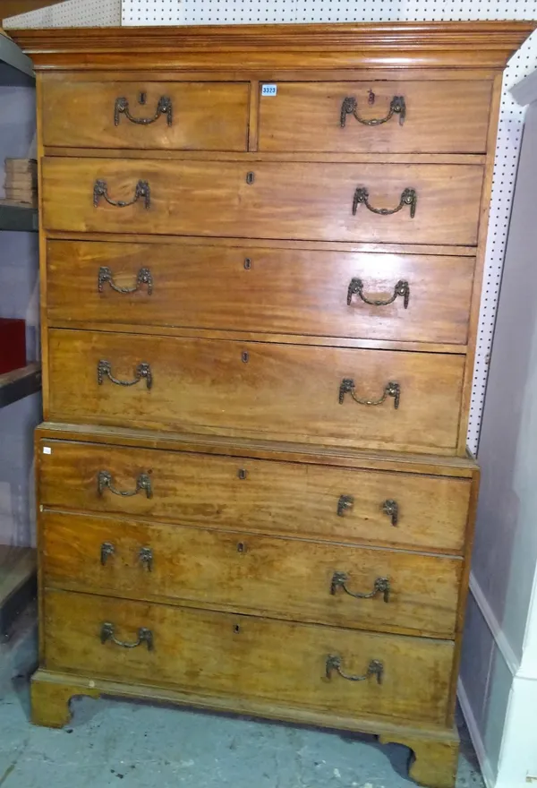 A George III mahogany chest on chest, with two short over six long graduated drawers, on bracket feet, 118cm wide x 183cm high.