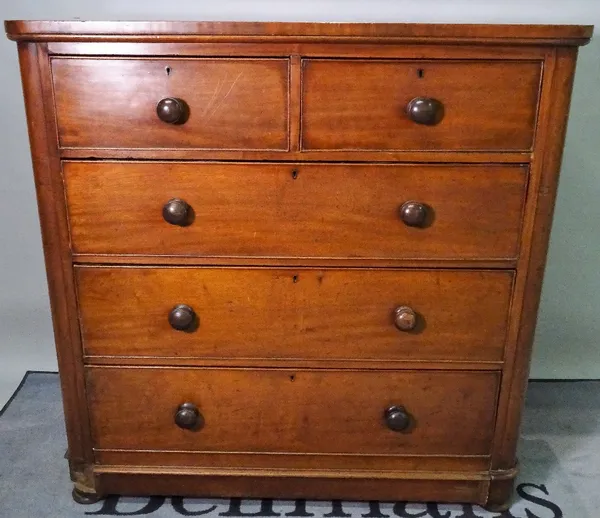 A late Victorian mahogany chest, of two short and three long drawers on bun feet, 121cm wide x 121cm high.