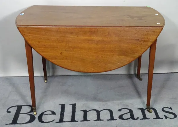 A George III mahogany single drawer Pembroke table on tapering square supports, 106cm wide x 70cm high.