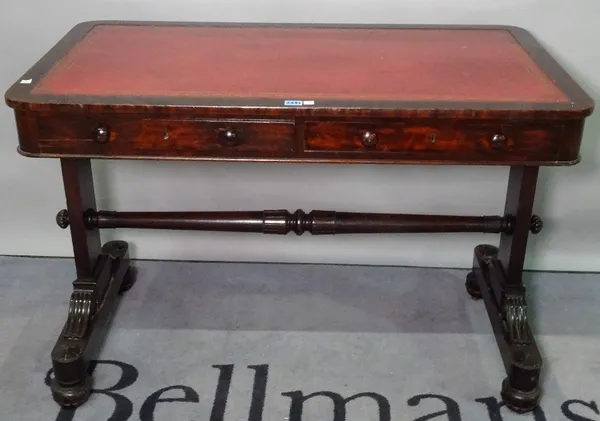 A late Victorian mahogany writing desk, with two frieze drawers and a tooled leather top, 107cm wide x 79cm high.