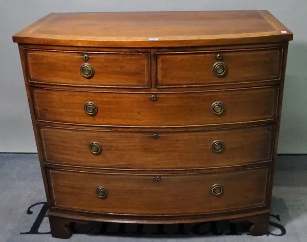 A late George III mahogany bowfront chest, with two short and three long graduated drawers, 101cm wide x 96cm high.