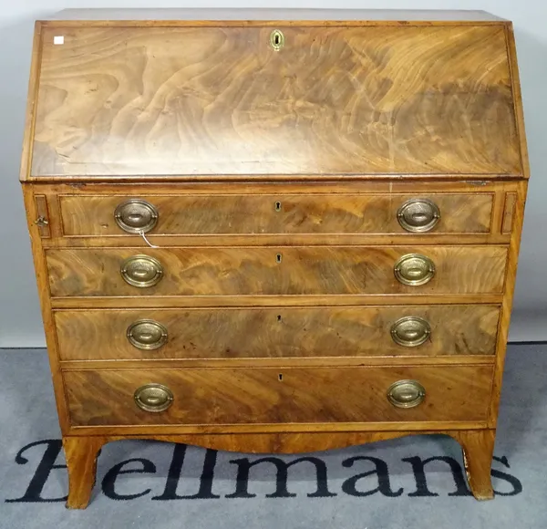 A George III mahogany bureau, the fitted interior over four compartmented drawers, 99cm wide x 108cm high.