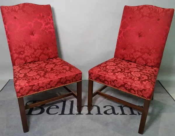 A set of six George III style hump back dining chairs, on canted mahogany supports, 58cm wide x 101cm high.