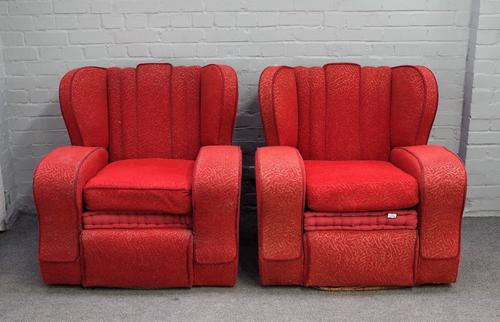 A pair of Art Deco pattern red upholstered square shell back easy armchairs, 89cm wide x 90cm high.