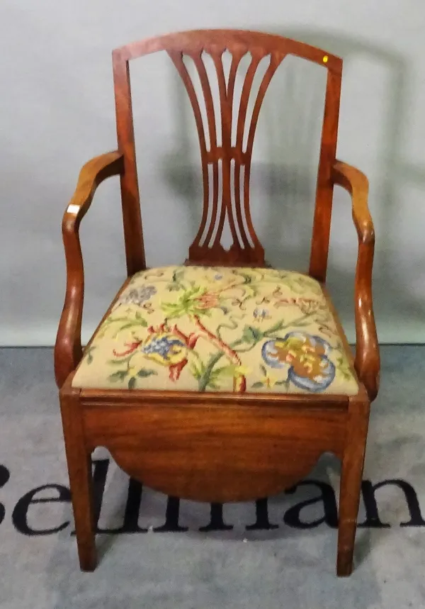 A late George III mahogany commode open armchair, on tapering square supports, 55cm wide x 96cm high.