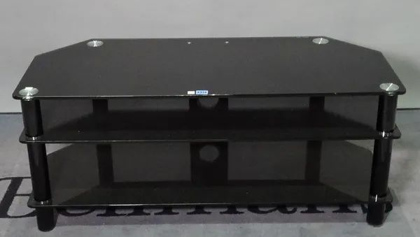 A modern three tier glass TV stand, 105cm wide x 44cm high.