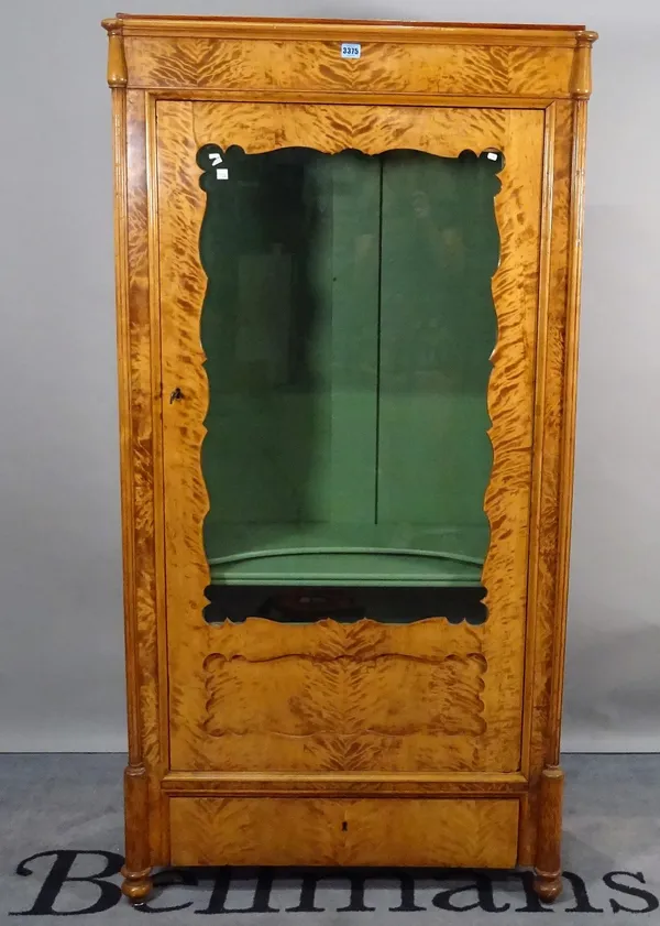 A 19th century North European satin birch display cabinet, over single drawer on turned supports, 83cm wide x 163cm high.