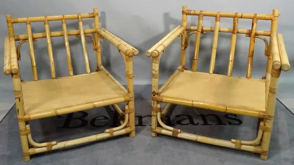 A pair of modern faux bamboo low armchairs, 74cm wide x 71cm high.