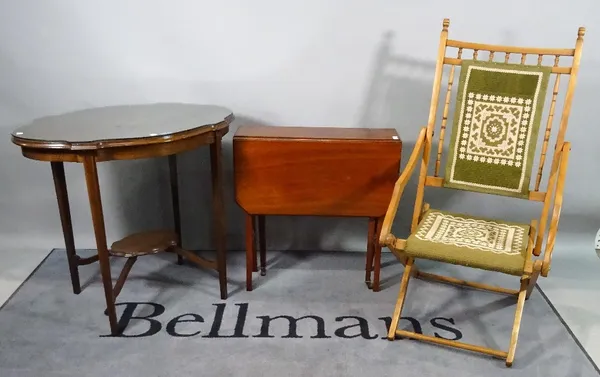 An Edwardian mahogany oval centre table, 75cm wide x 69cm high, a late Edwardian drop flap side table, 60cm wide x 61cm high, and an early 20th centur