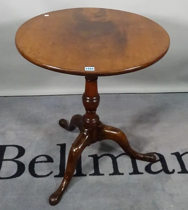 A George III and later mahogany tripod table, on birdcage surmount on three outswept supports, 63cm diameter x 72cm high.