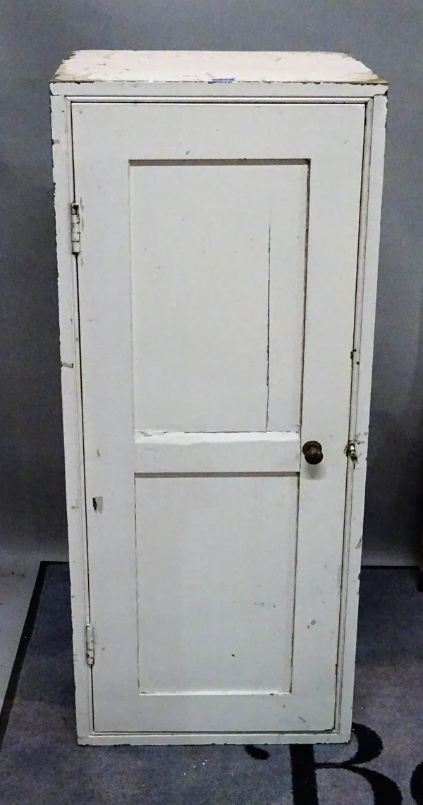 A white painted four tier shoe cupboard on plinth base, 43cm wide x 101cm high.