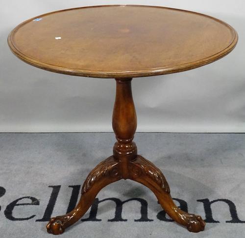 A George III and later mahogany tripod table, the dished circular top on ball and claw supports, 74cm diameter x 71cm high.