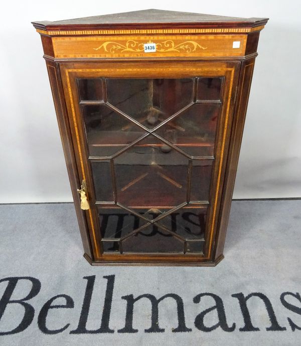 An Edwardian inlaid mahogany corner display cabinet, on bracket feet, 72cm wide x 204cm high.