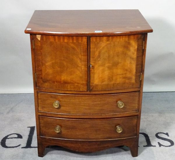 A George III and later mahogany bowfront commode chest, with cupboard doors over two short drawers, 60cm wide x 74cm high.