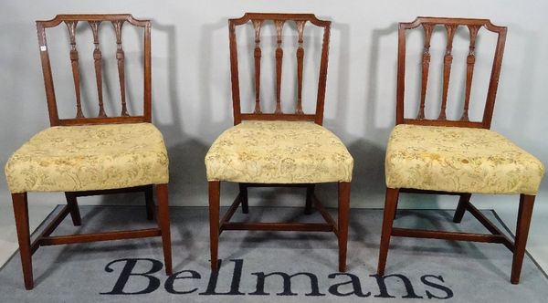 A set of five 19th century mahogany dining chairs, with upholstered seats and square tapering supports, 92cm high x 51cm wide.